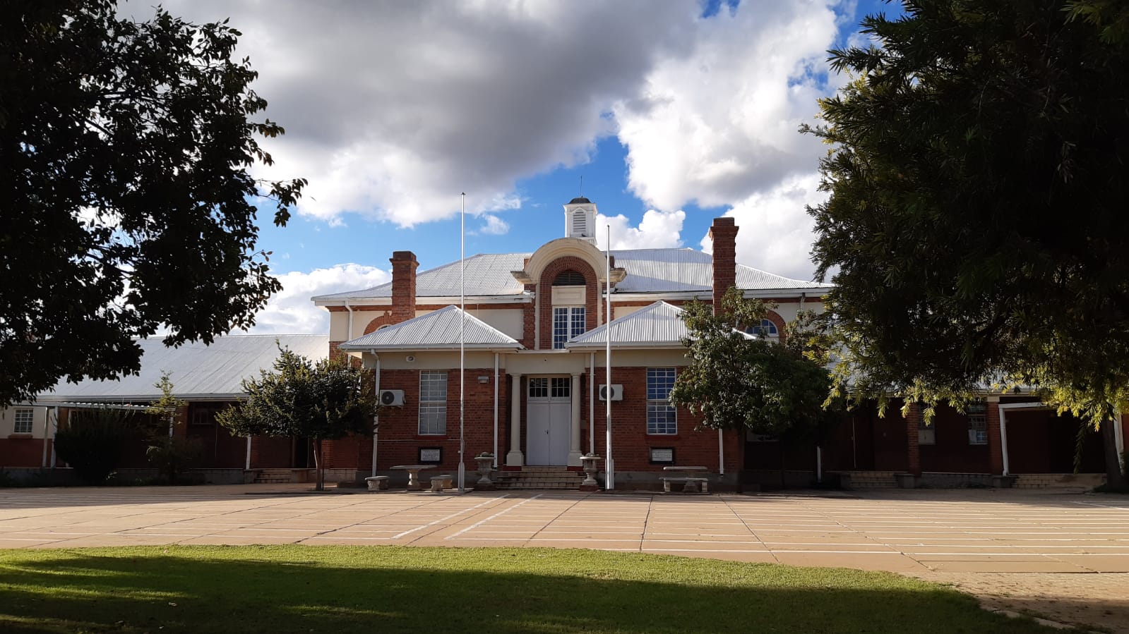 Front view of Vryburg High School main building in the afternoon sunlight, Vryburg, North West, South Africa